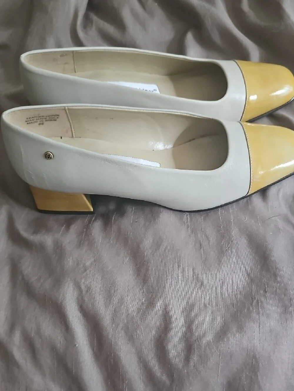 Etienne Aigner White Flats with Yellow Patent Cap Toe Accent